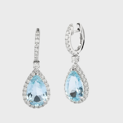 Ma. Metal Earring with Topaz